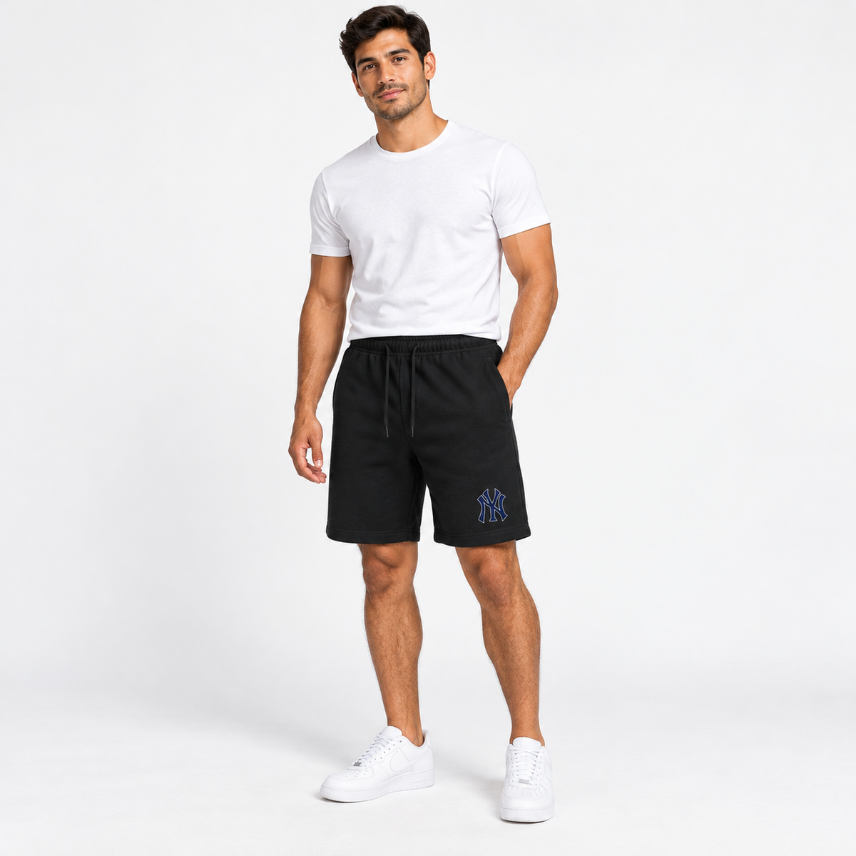 Black New York Yankees fleece shorts - model wearing view